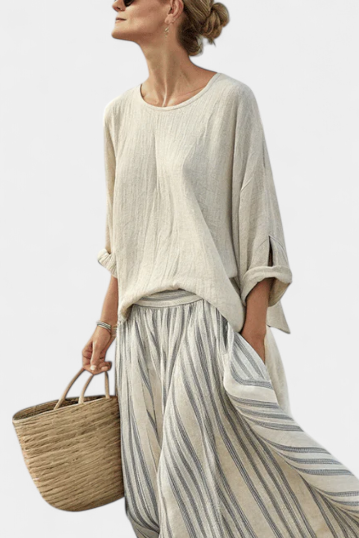 Aurora – Comfortable blouse and striped midi skirt