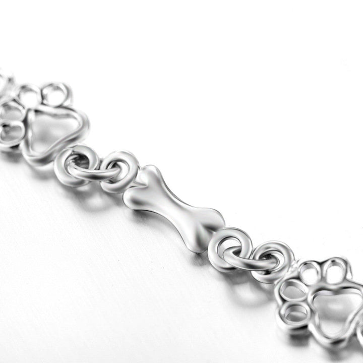 Bracelet with Dog Paw and Bone Charms in Silver