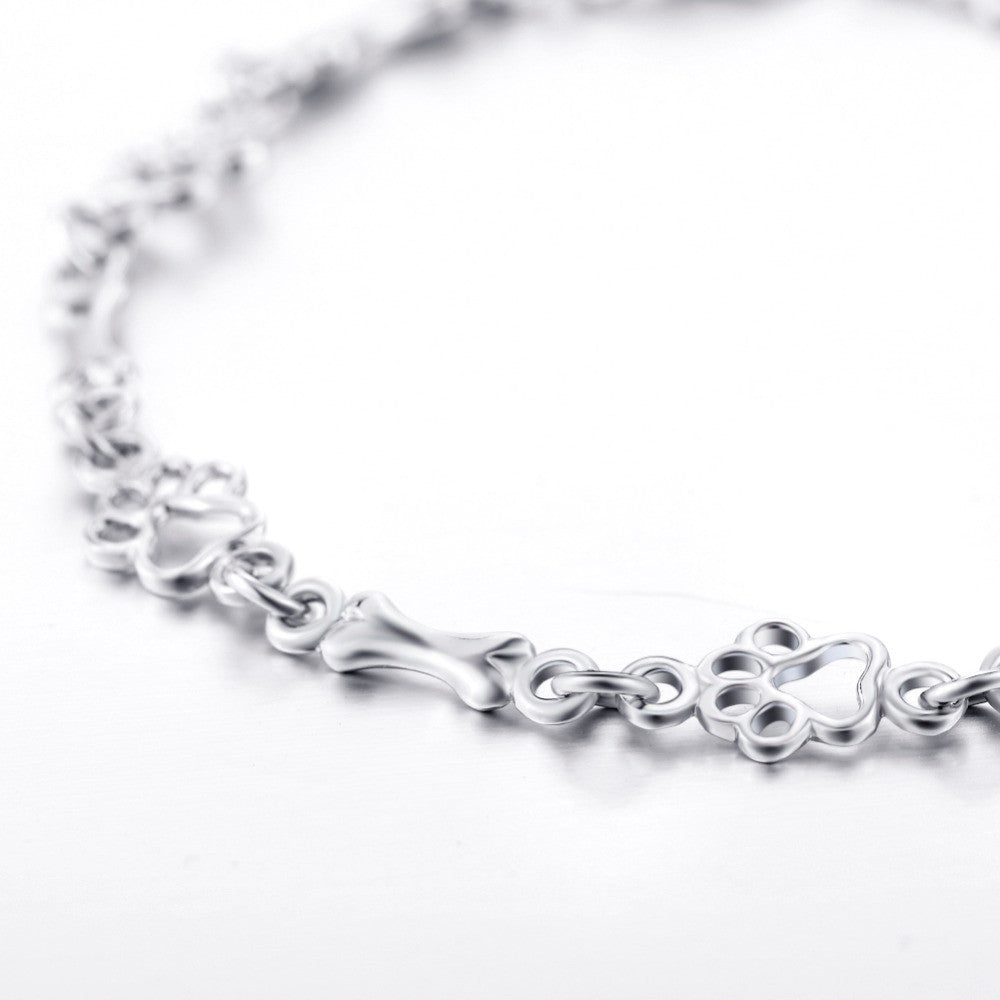 Bracelet with Dog Paw and Bone Charms in Silver