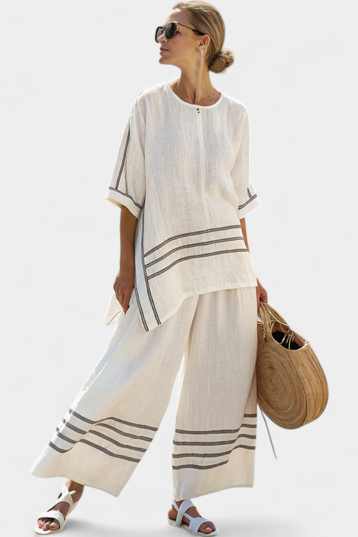 Vittorina – sophisticated asymmetric striped top and bold pants