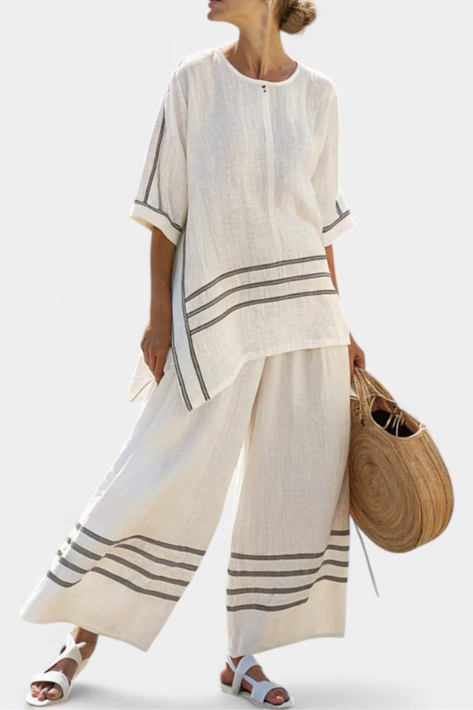 Vittorina – sophisticated asymmetric striped top and bold pants